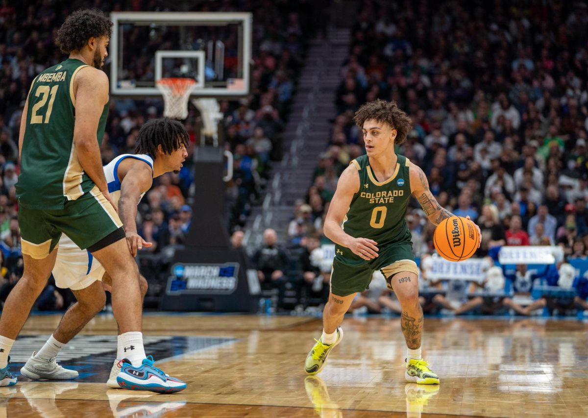 Kyan Evans (0) looks for a lane during Colorado State University's NCAA first-round matchup against Memphis March 21. CSU won 78-70.