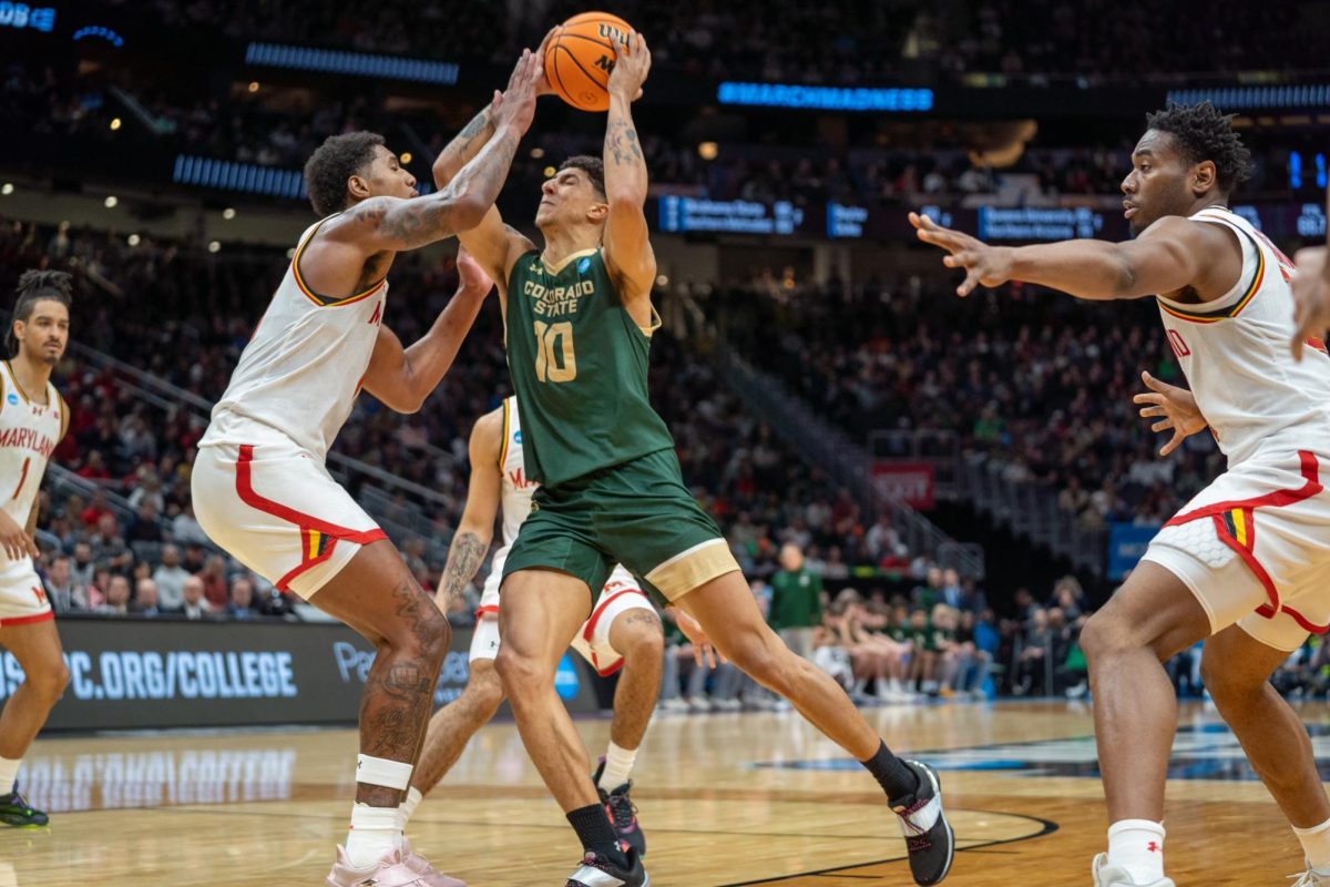 Nique Clifford (10) initiates contact driving to the rim in Colorado State University's second-round NCAA loss to Maryland March 23. CSU lost 72-71.