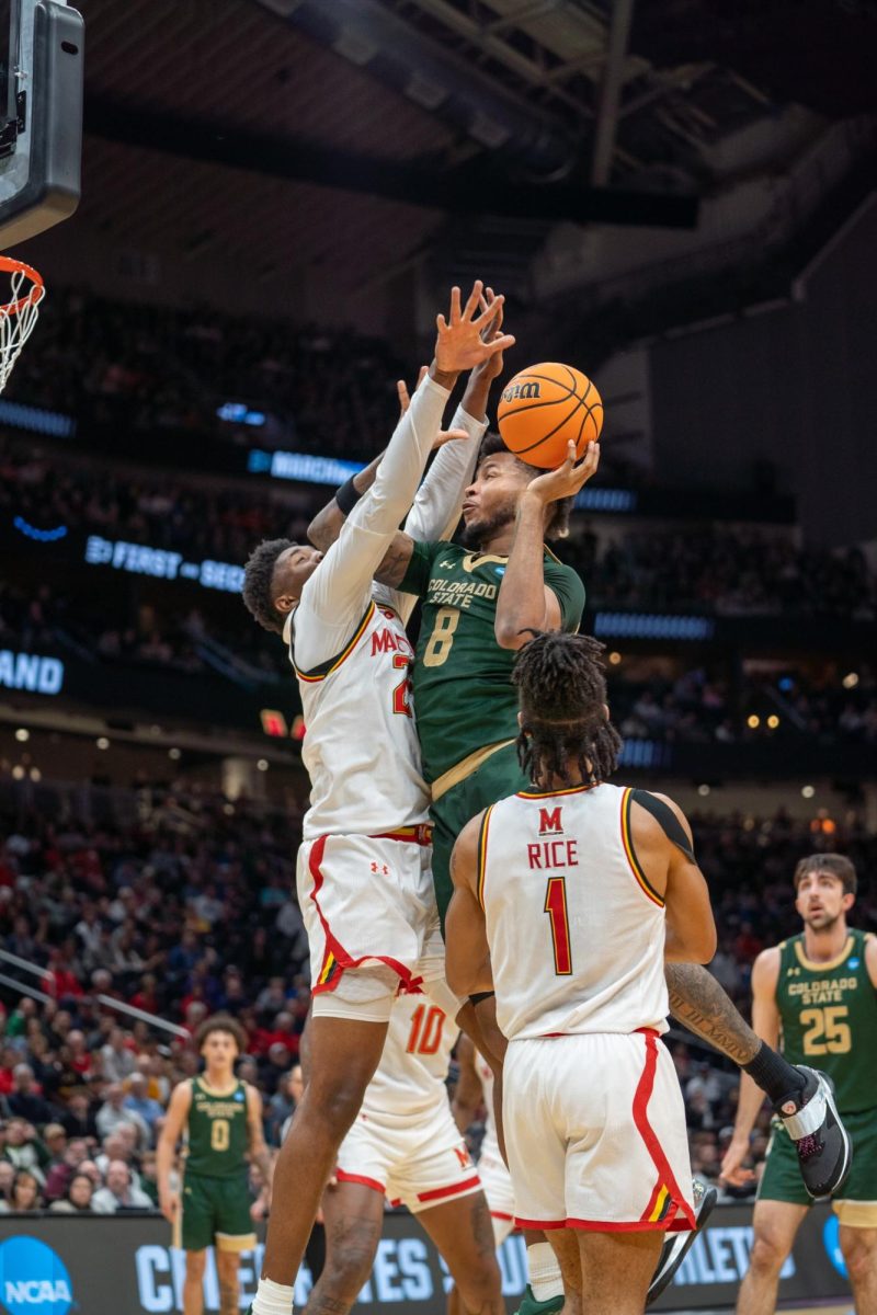 Forward Jaylen Crocker-Johnson (8) attempts a shot during Colorado State University's game against the University of Maryland in the Climate Pledge Arena in Seattle March 23. CSU lost 71-72.
