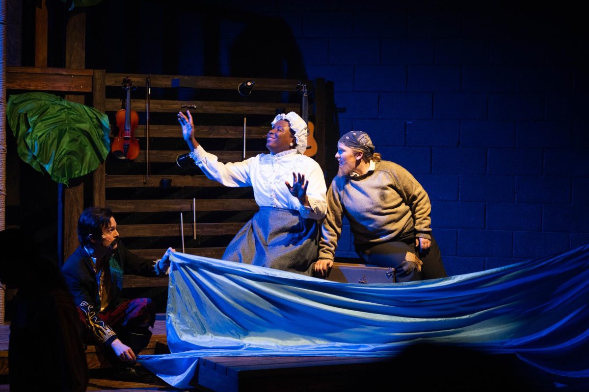 Image of two people performing a play.