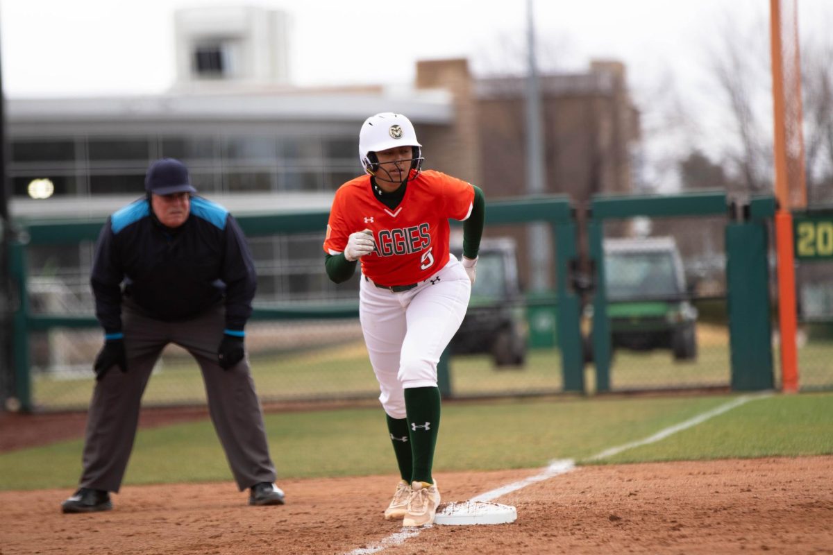 Catcher Carolina Buffaloe prepares to race toward home base in game against University of Montana on March 30 at Rams Field in Fort Collins Colorado. Rams win 9-1 runs. Photo taken by Erica Pickering.