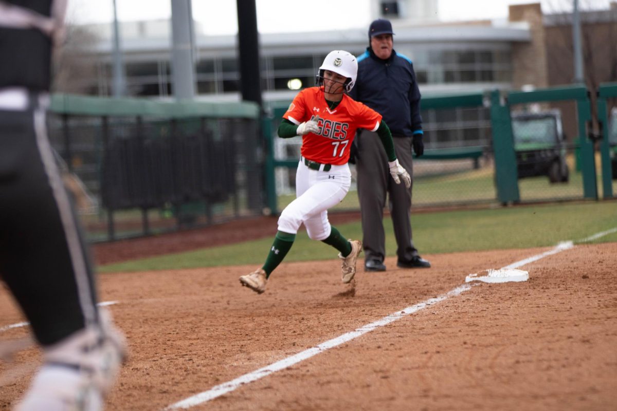Infielder Morgan Coleman runs toward home base during game against University of Montana on March 30 at Rams Field in Fort Collins Colorado. Rams win 9-1 runs. Photo taken by Erica Pickering.