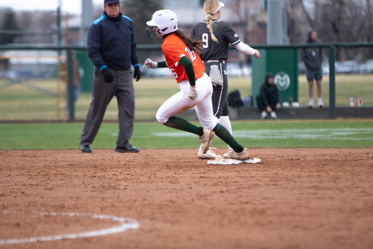 Outfielder Lauren Stucky runs toward second base in game against University of Montana on March 30 at Rams Field in Fort Collins Colorado. Rams win 9-1 runs. Photo taken by Erica Pickering.