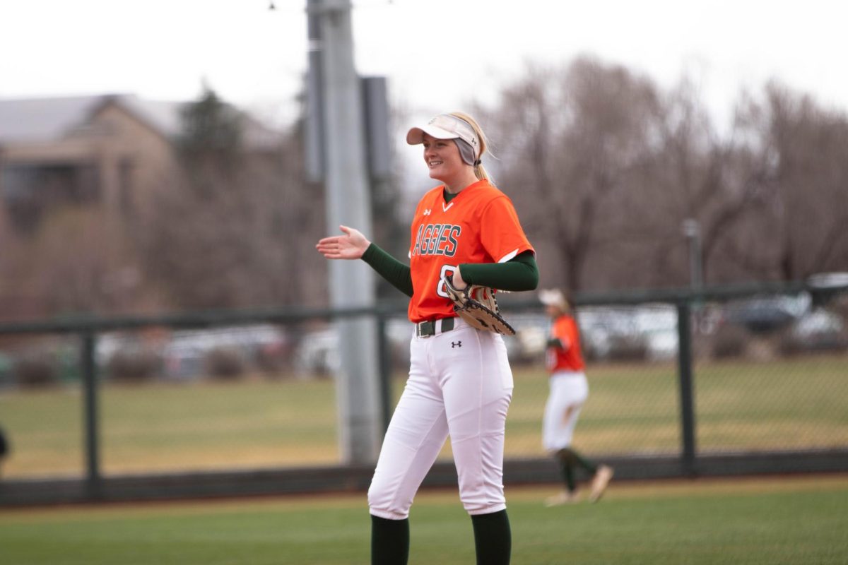 Catcher Brooke Bohlender has some celebrates a good defensive  run during game against University of Montana on March 30 at Rams Field in Fort Collins Colorado. Rams win 9-1 runs. Photo taken by Erica Pickering.