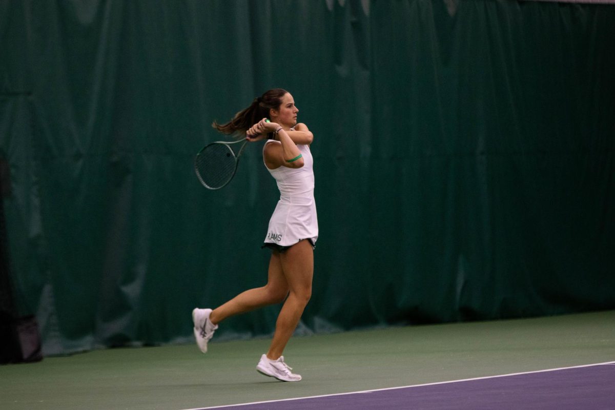 Lauren Avelar hits the ball during match against San Diego State University on March 30 at the Fort Collins Country Club in Fort Collins Colorado. Photo taken by Erica Pickering.