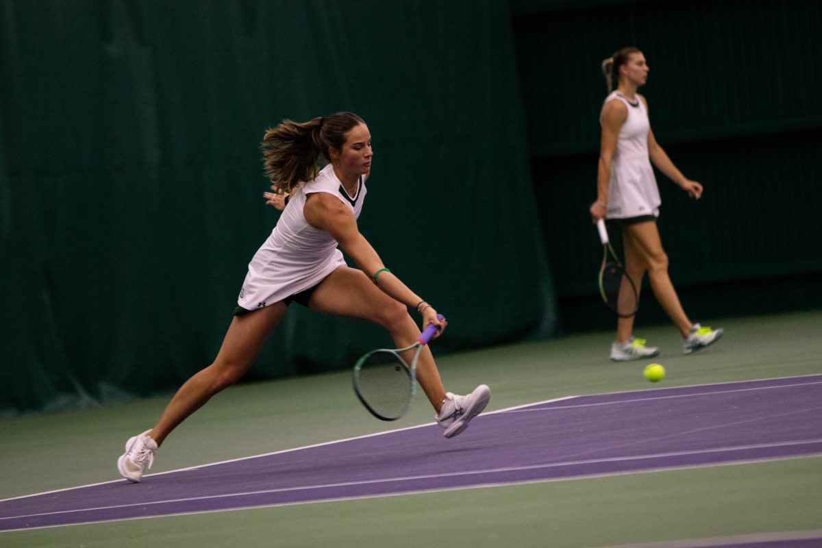 Lauren Avelar races to return the ball during match against San Diego State University on March 30 at the Fort Collins Country Club in Fort Collins Colorado. Photo taken by Erica Pickering.