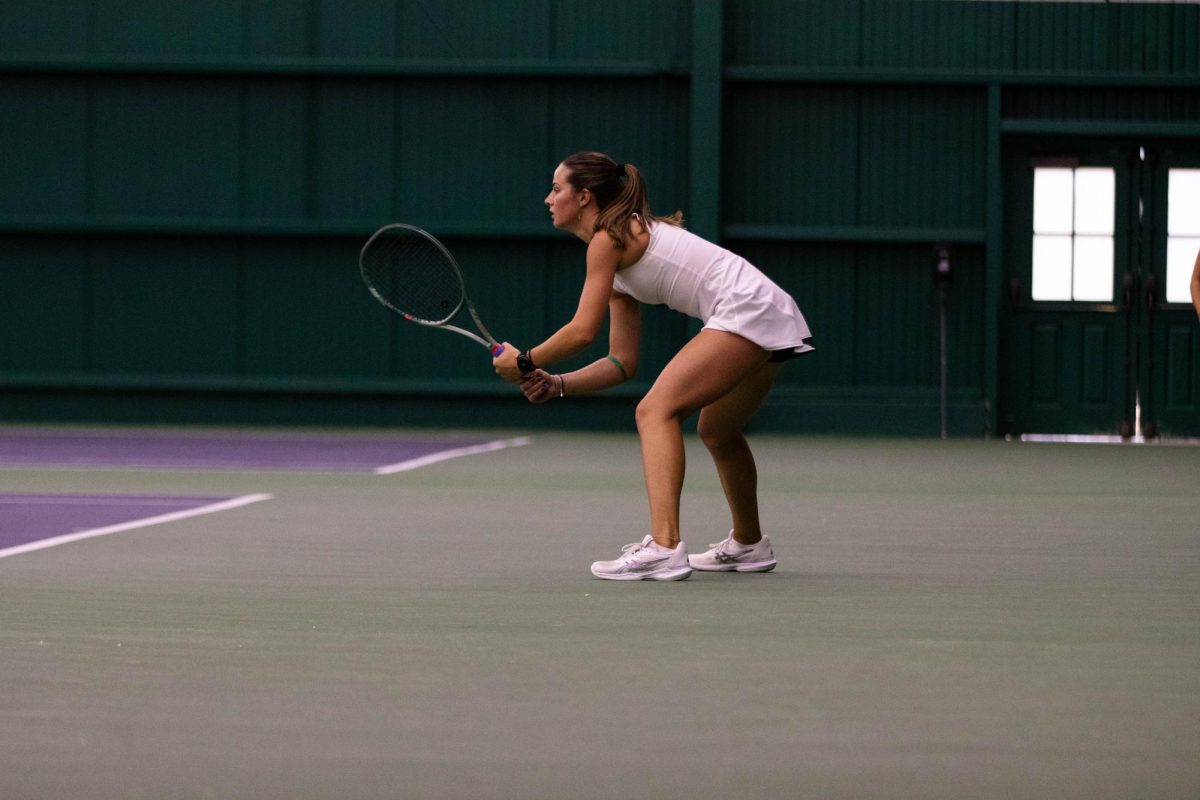 Lauren Avelar prepares for her hit during match against San Diego State University on March 30 at the Fort Collins Country Club in Fort Collins Colorado. Photo taken by Erica Pickering.
