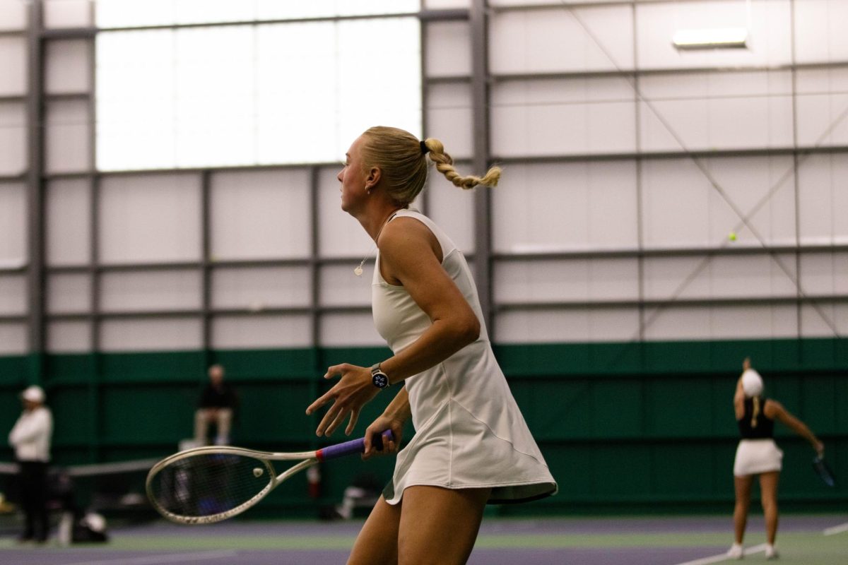Sarah Weekley preparing for her next hit during match against San Diego State University on March 30 at the Fort Collins Country Club in Fort Collins Colorado. Photo taken by Erica Pickering.