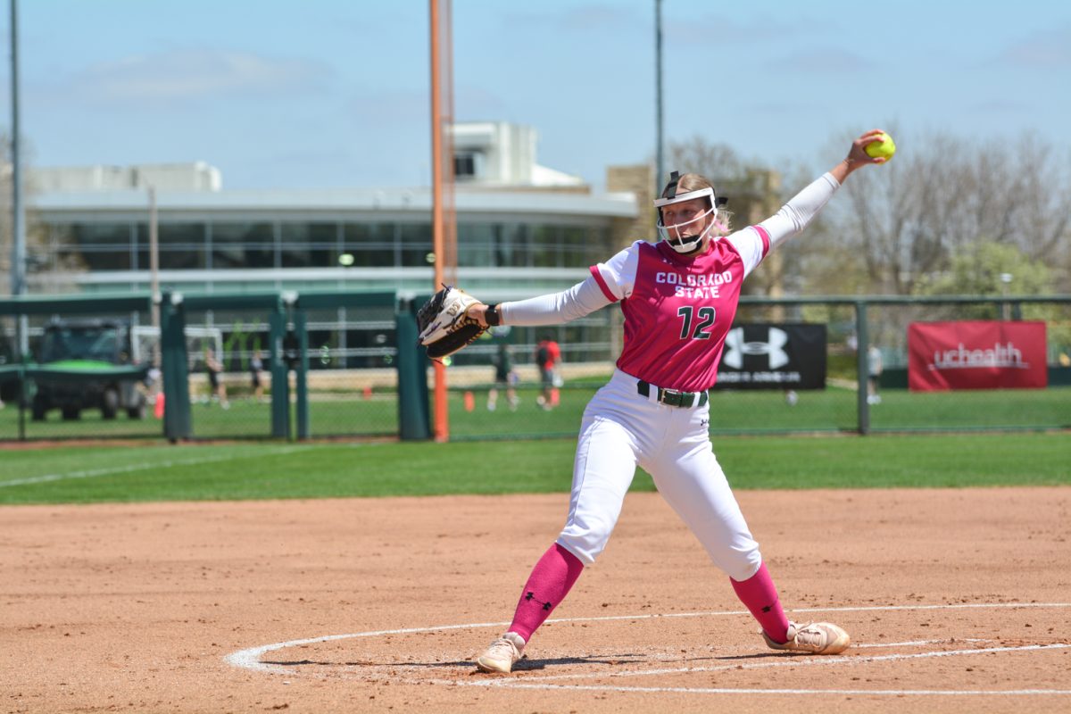 Reagan Wick pitching against a Fresno State player April 26. Reagan pitched against Fresno State for the entire first game and helped her teammates defeat Fresno with a score of 7-0.