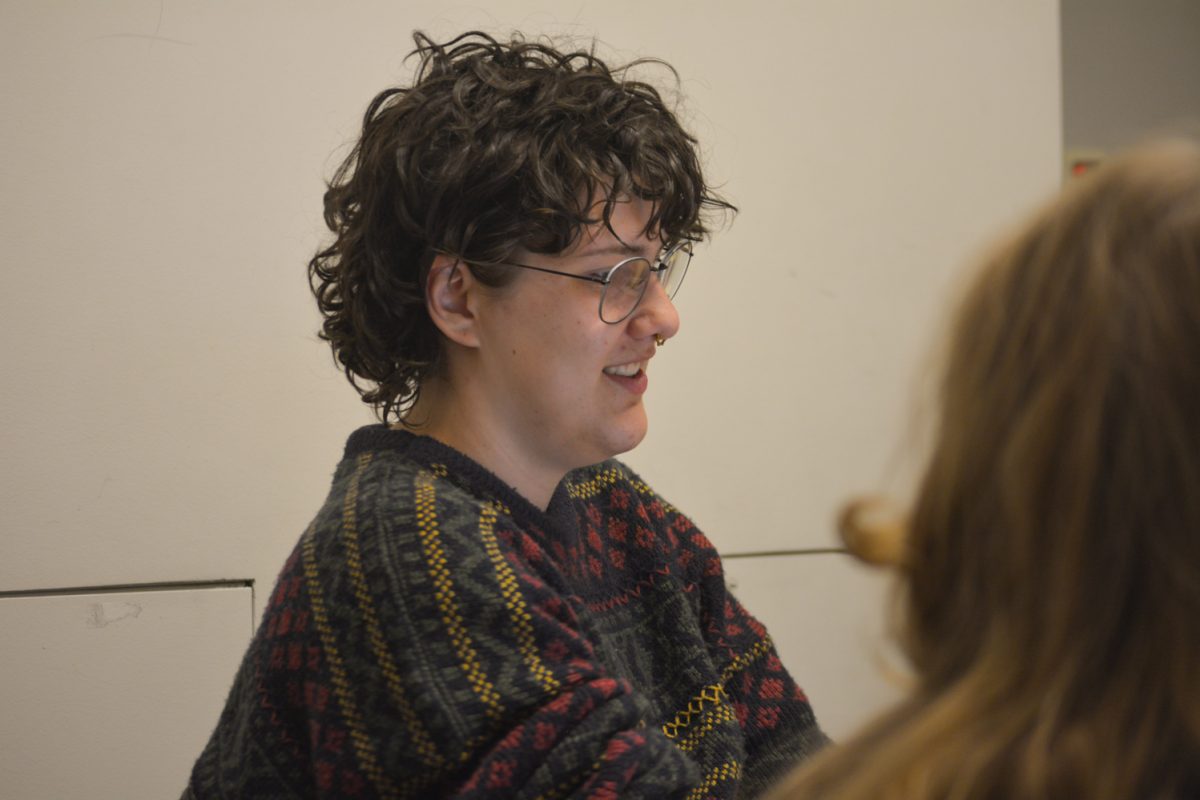 Jay Mario Bates Domenech writing notes at the Restorative Justice meeting April 8. The restorative Justice club is a small but mighty club here at Colorado State University.