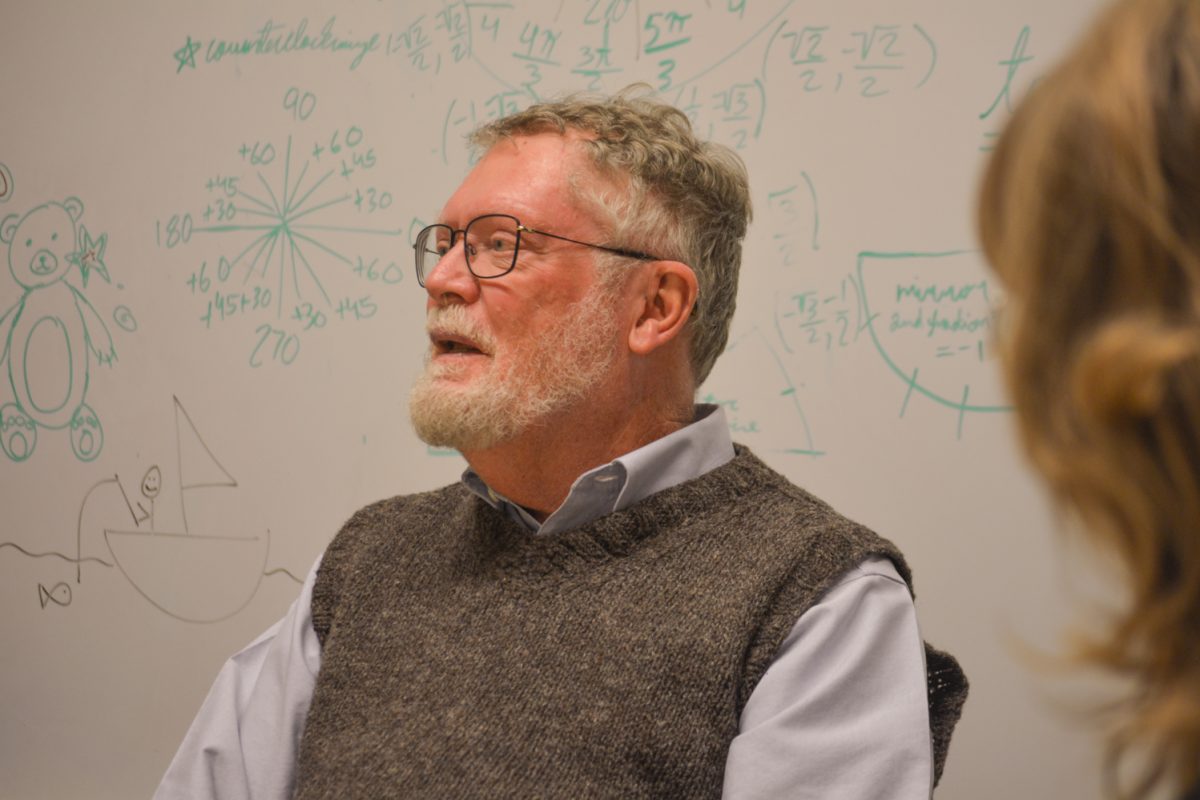 Tom Cavanagh speaks to the members of the Restorative Justice club meeting April 8. Cavanagh teaches in ethnic studies at Colorado State University.