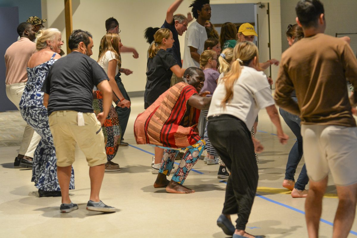 The crowd dancing along to the traditional music played by drummers April 12. This was at the Francophone African Festival showcasing music, food and fashion. 