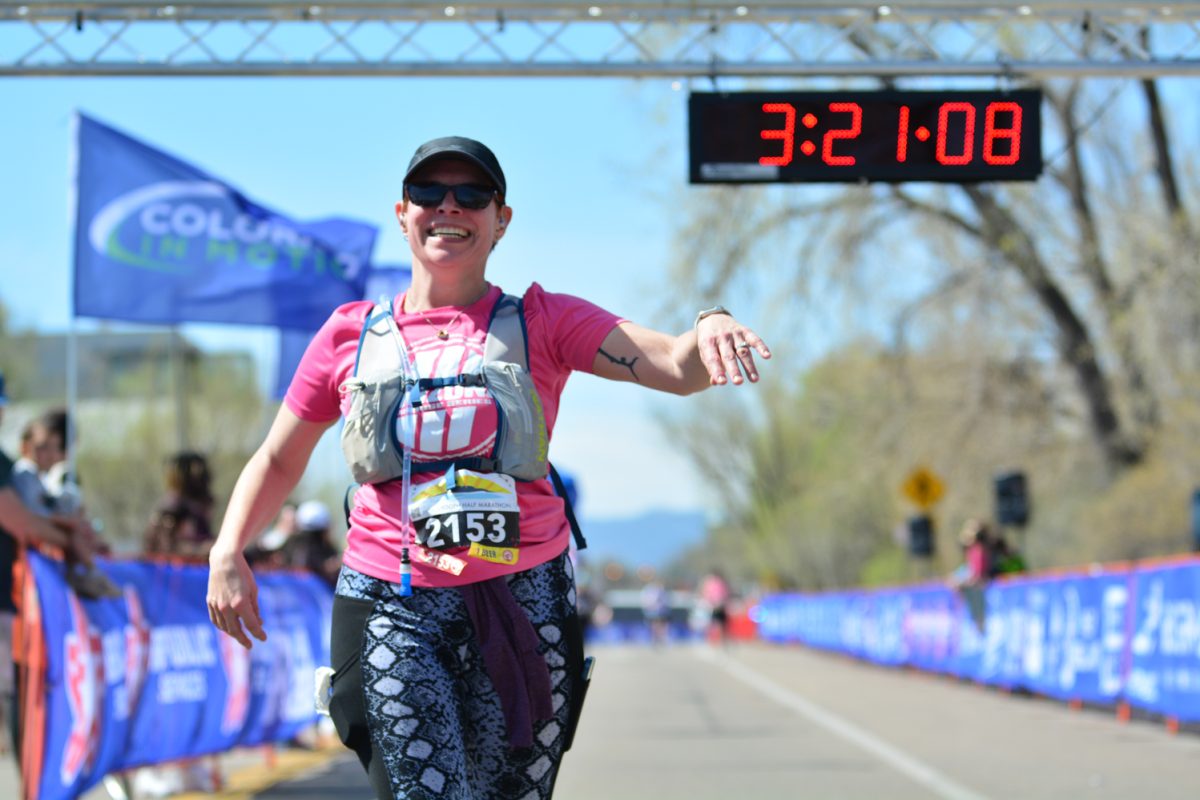 Melanie O'Donahue crossing the finish line of Horsetooth Half Marathon April 13. Melanie placed 1869 and happily crossed the finish line after finishing 13.1 miles. 