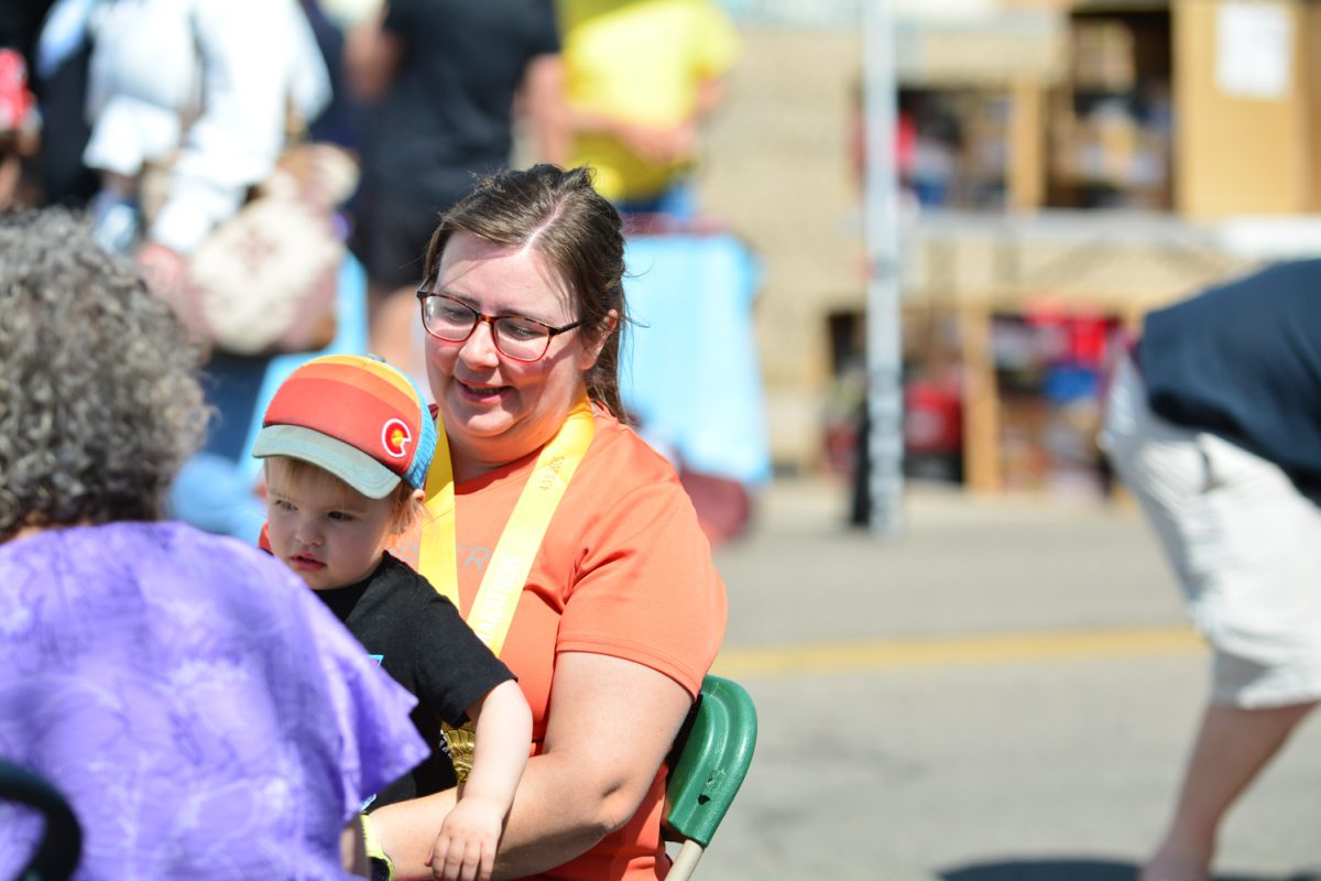 Jen Vincent-Bennet celebrating with her son and parents after finishing the Horsetooth Half Marathon April 13. "The last couple miles was a slog but my daughter cheered me on" Jen stated. "I played soccer in college and just wanted to stay active and healthy" when asked the reason she participated. 