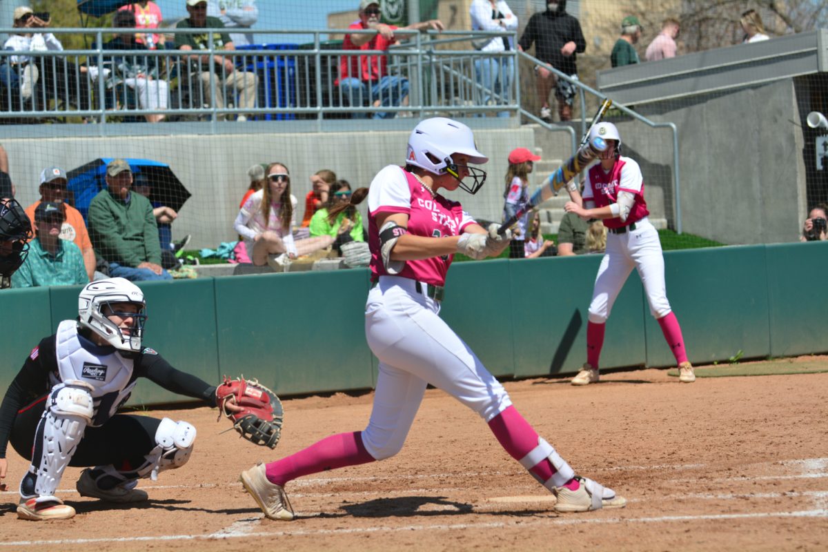 Lauren Stucky hitting a ball against Fresno State pitcher April 26. Lauren and her teammates defeated Fresno State with a score of 7-0. 
