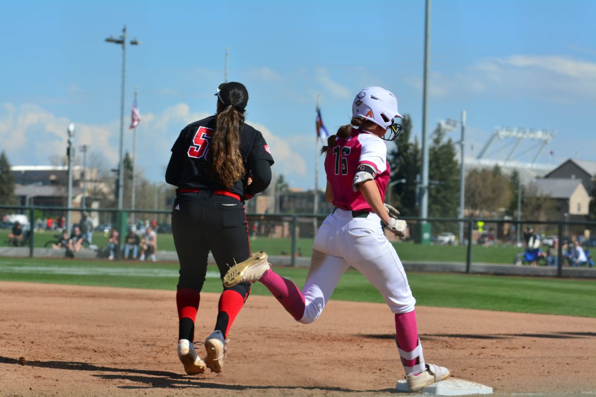Lauren Stucky running through first base after her ball got caught by a Fresno State player April 26. Fresno state defeated Lauren Stucky and her teammates during their second game. 
