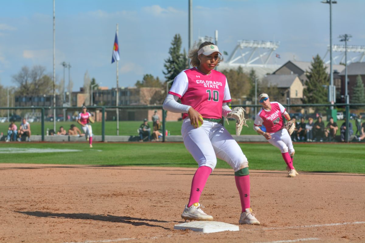 Jailey Wilson touching first base to get a Fresno State bulldog player out April 26. This was the last out that Colorado State needed to get back on offense.