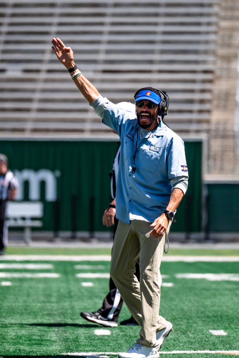 Colorado State University head football coach Jay Norvell yells to his players during a spring football scrimmage April 26.