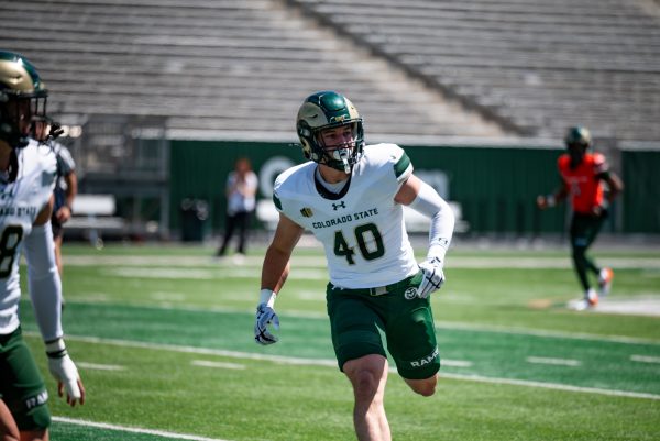 Colorado State University linebacker Owen Long (40) finishes a play during a spring football scrimmage April 26.