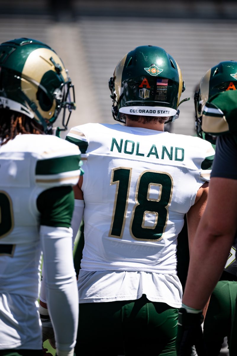 Colorado State University defensive back AJ Noland (18) watches a play during a spring football scrimmage April 26.