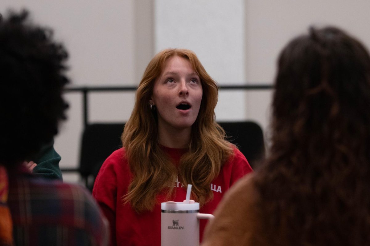 Sofia Lindsey warms up her voice during the CSU Mainstreet A Capella club practice at the University Center of the Arts in Fort Collins Colorado on April 4. Photo taken by Erica Pickering.