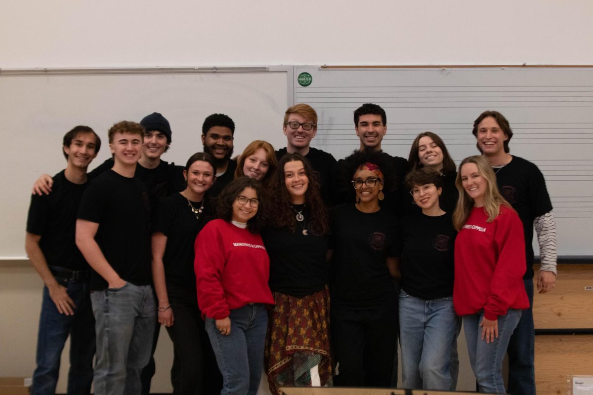The CSU Main Street A Capella club stands for a portrait at Universty Center for the Arts in Fort Collins Colorado on April 4. Photo taken by Erica Pickering.