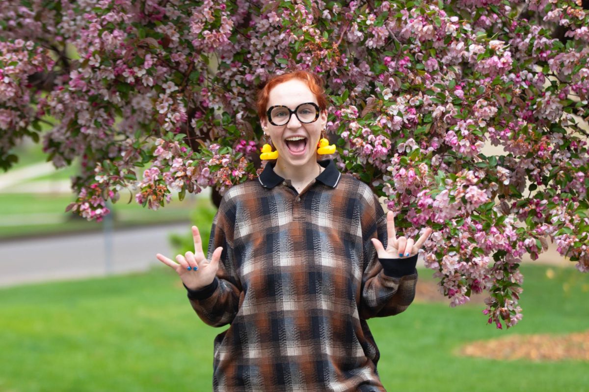 Ella Smith, Colorado State University student poses for a portrait in Fort Collins Colorado at Colorado State University on April 26. Photo taken by Erica Pickering.