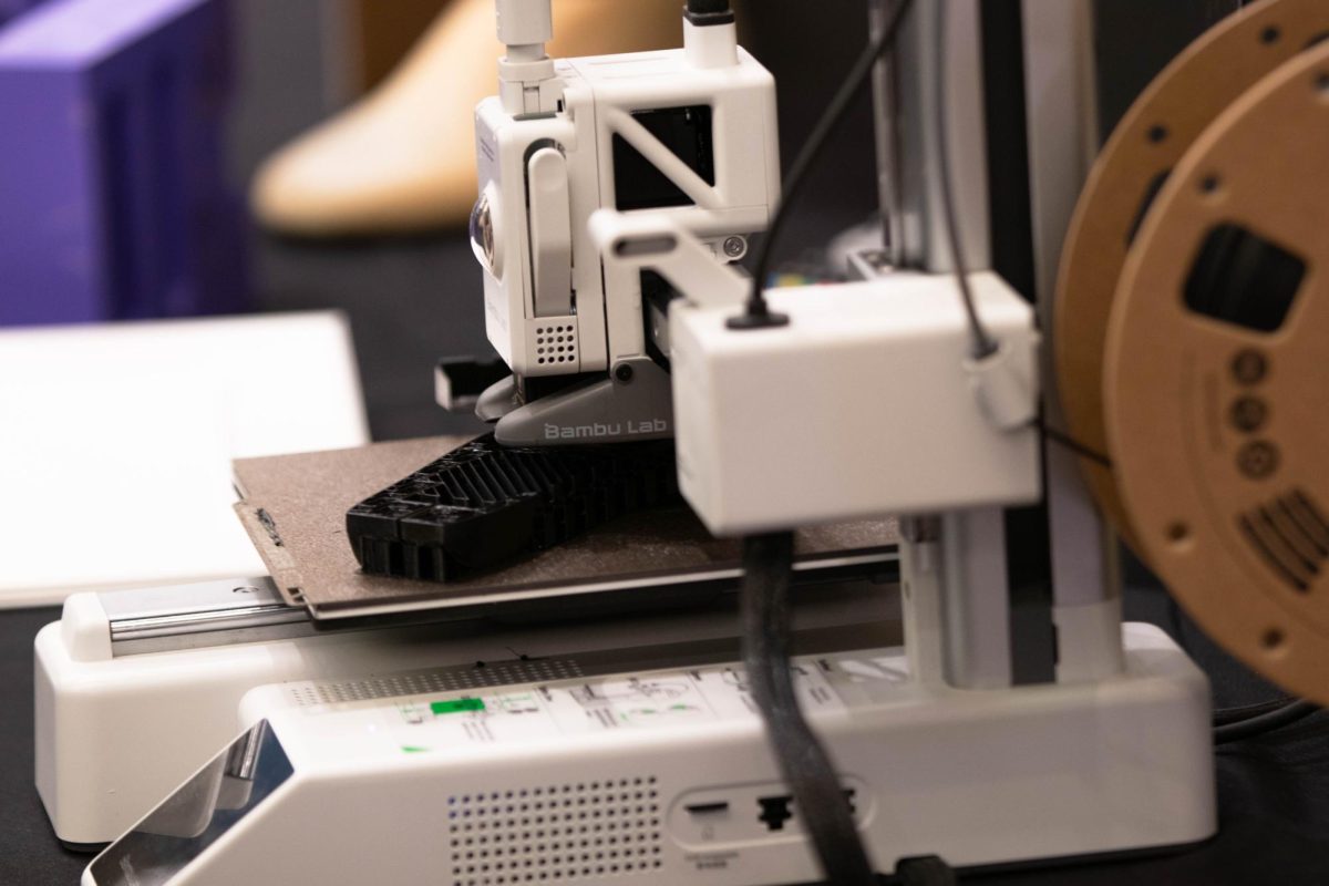 Step Up Prosthetics displays how they create their 3D printed prosthetics during Colorado State University's College of Engineering's E-Days in the Lory Student Center on April 18. Photo taken by Erica Pickering.