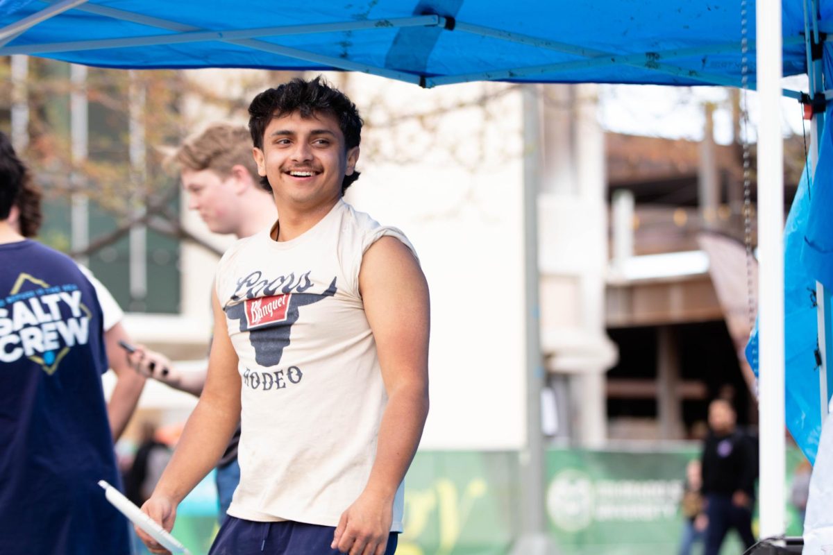 Sergio Strife preparing to get pied for Delta Chi fundaraiser to support cancer research on the Lory Student Center Plaza at Colorado State University Fort Collins Colorado on April 27. "I enjoy it and I think it's fun now." Said Ethan Valdez. Photo taken by Erica Pickering.