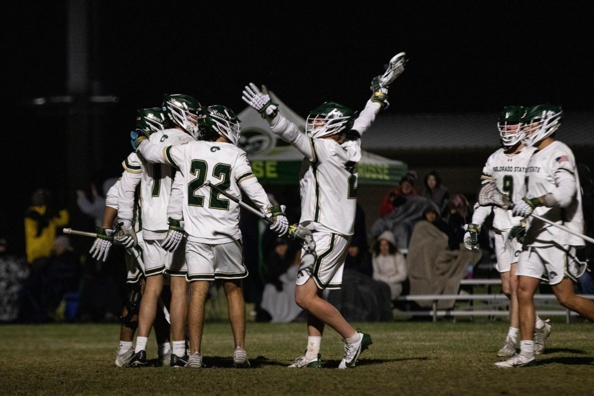 Colorado State University celebrate a goal in game against University of Utah in Fort Collins Colorado at Colorado State University on April 4. Colorado State University wins 9-4. Photo taken by Erica Pickering.