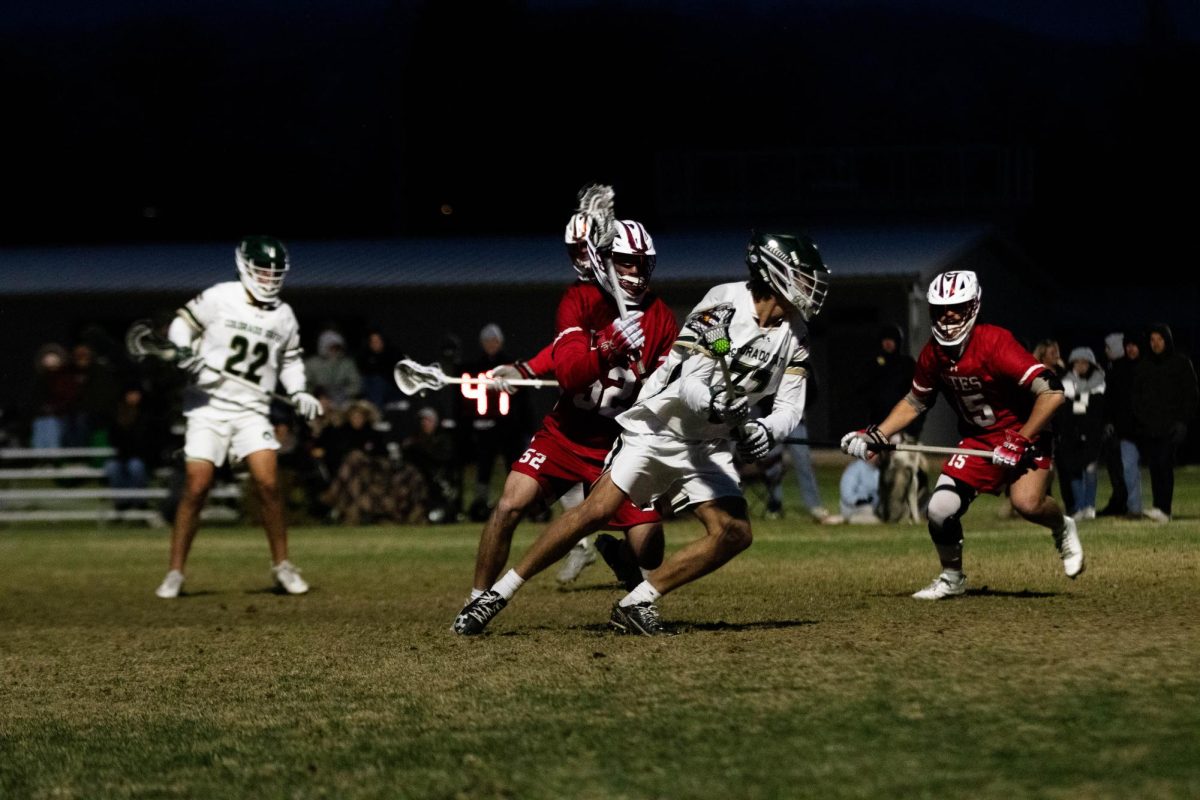 Kevin Carson penetrates the defense in game against University of Utah in Fort Collins Colorado at Colorado State University on April 4. Colorado State University wins 9-4. Photo taken by Erica Pickering.