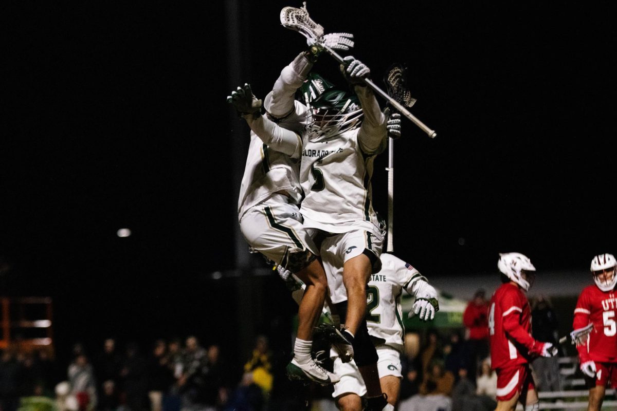 Rams jumping in celebration in game against University of Utah in Fort Collins Colorado at Colorado State University on April 4. Colorado State University wins 9-4.  Photo taken by Erica Pickering.