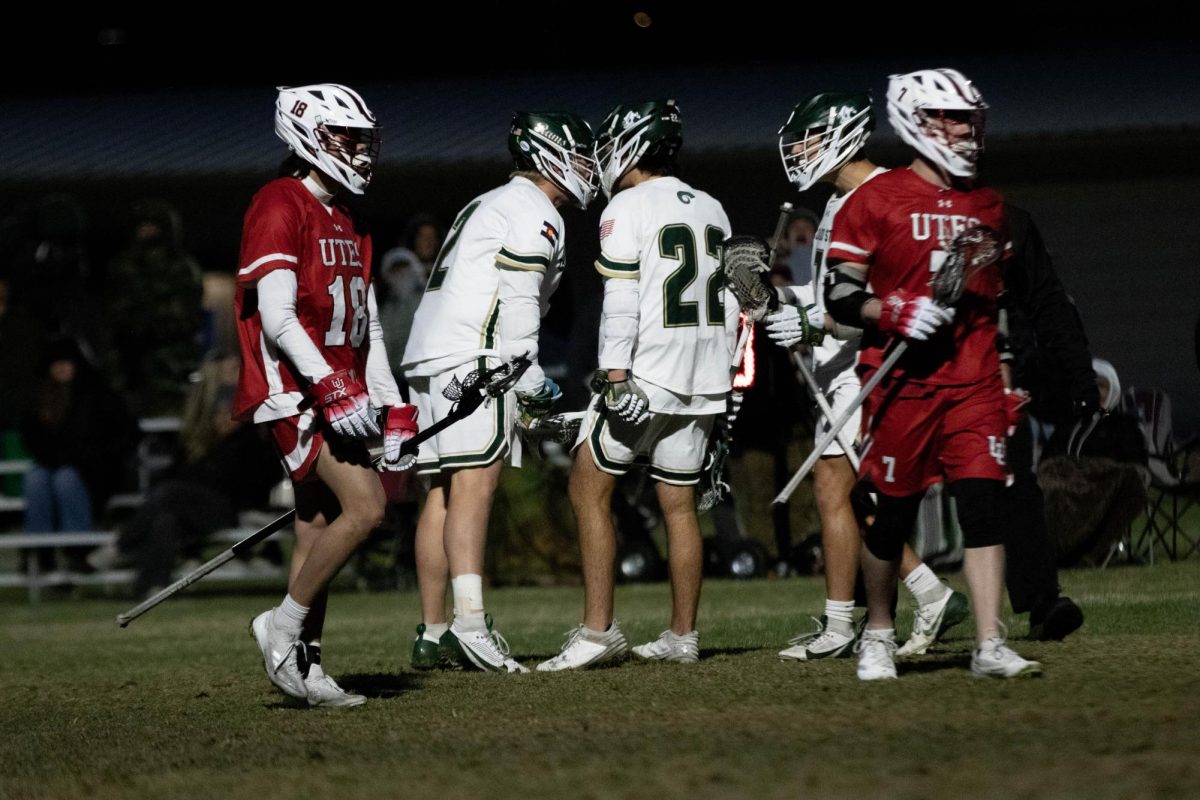 Colorado State University bang heads in celebraion of scoring a goal in game against University of Utah in Fort Collins Colorado at Colorado State University on April 4. Colorado State University wins 9-4. Photo taken by Erica Pickering.