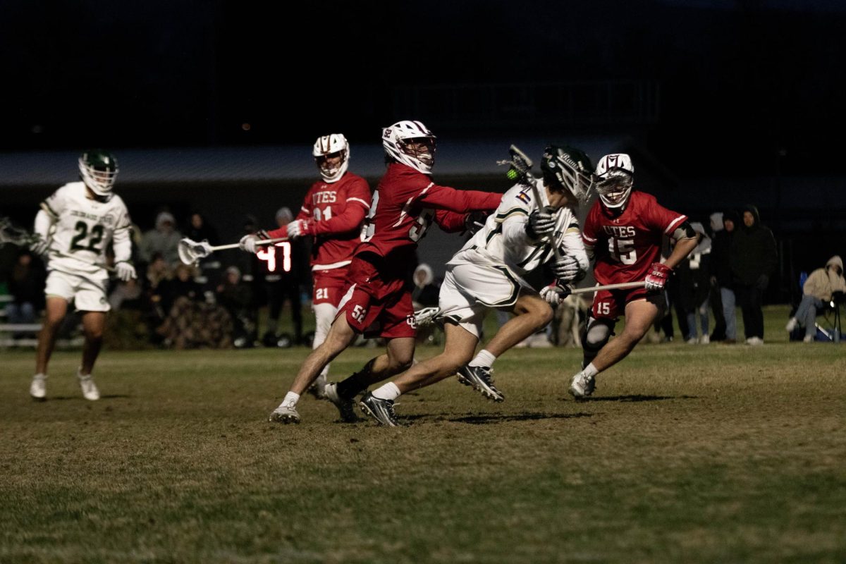 Kevin Carson runs toward the goal  in game against University of Utah in Fort Collins Colorado at Colorado State University on April 4. Colorado State University wins 9-4. Photo taken by Erica Pickering.