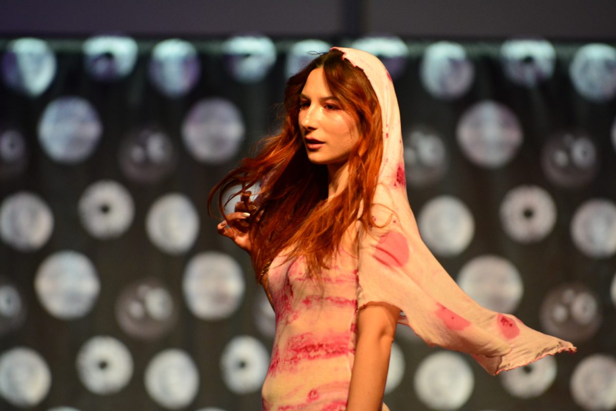 A model showcasing senior Bridget Browns collection April 3. This collection was in the Vivid Bloom category. 