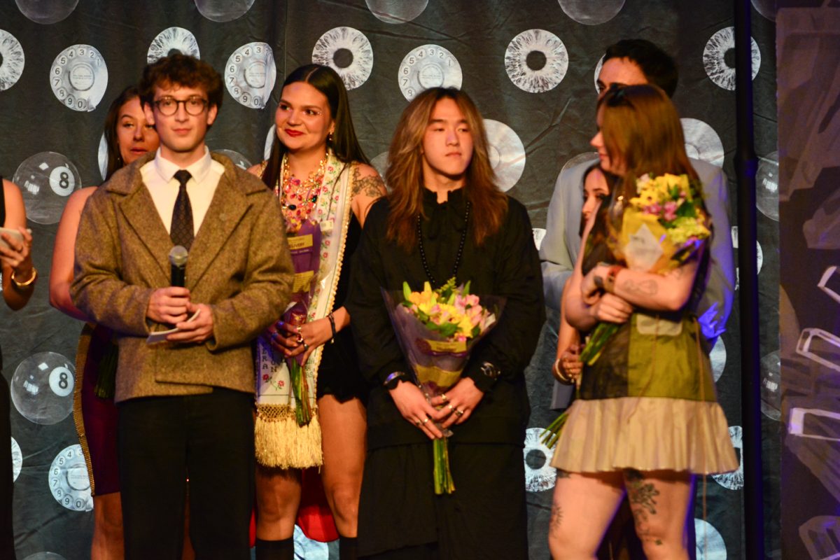 Sophie Scott, Latifa, Nat, Jack Mahoney, Johnny Hans and Alexandra Evans all on stage after getting their award May 2. This was at the Astral Threads Fashion Show.