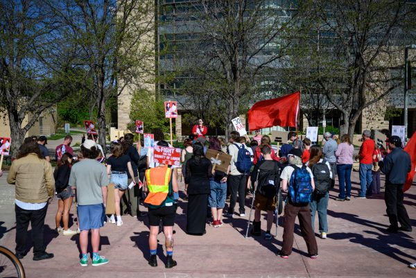 The March for Workers' Rights protest gathers protesters on the Lory Student Center Plaza May 2. Some of the groups present included the Colorado State University chapter of the Young Democratic Socialists of America and the Poudre Education Association.