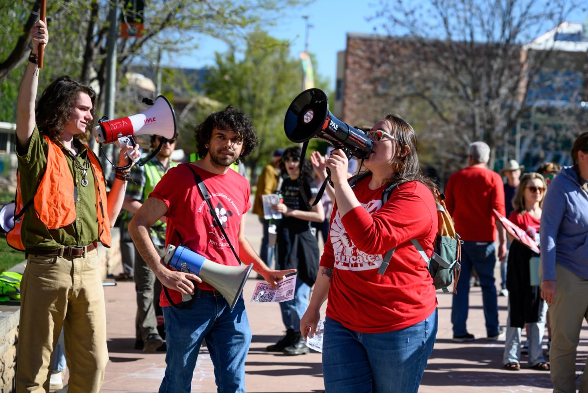 Organizers of the "March for Workers' Rights" protest lead assembled protestors out of the Lory Student Center Plaza May 2. As they moved out of the plaza, they shouted, "The people united will never be defeated."