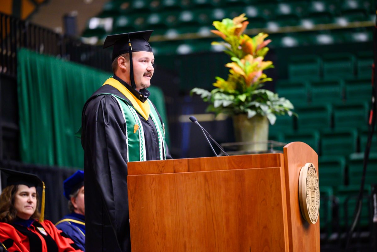 Final student speaker Joey Long addresses the graduates of Agricultural Biology, Horticulture and Landscape Architecture and Soil and Crop Sciences during their recognition ceremony in Moby Arena May 18.