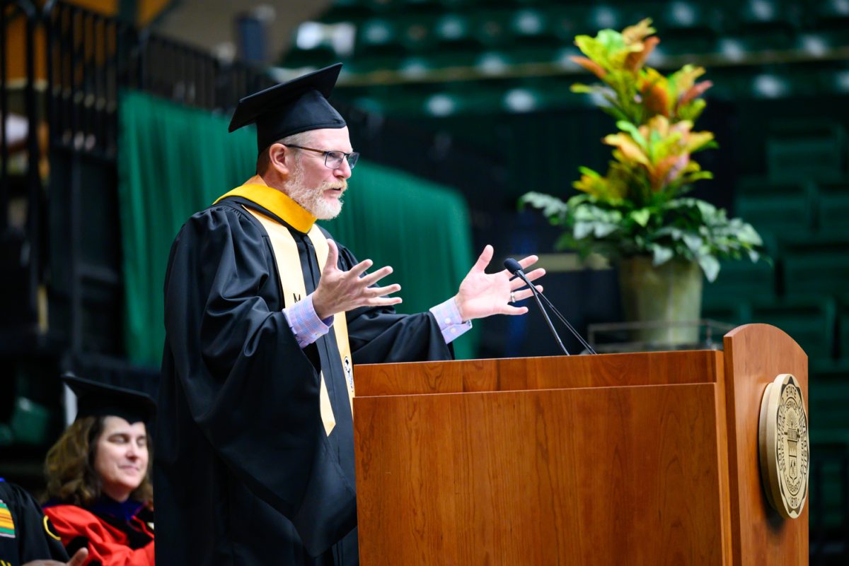 Assistant Dean of Teaching Practice and Academic Programs Matt Camper congratulates the graduates of the Agricultural Biology, Horticulture and Landscape Architecture and Soil and Crop Sciences departments during their recognition ceremony in Moby Arena May 18.