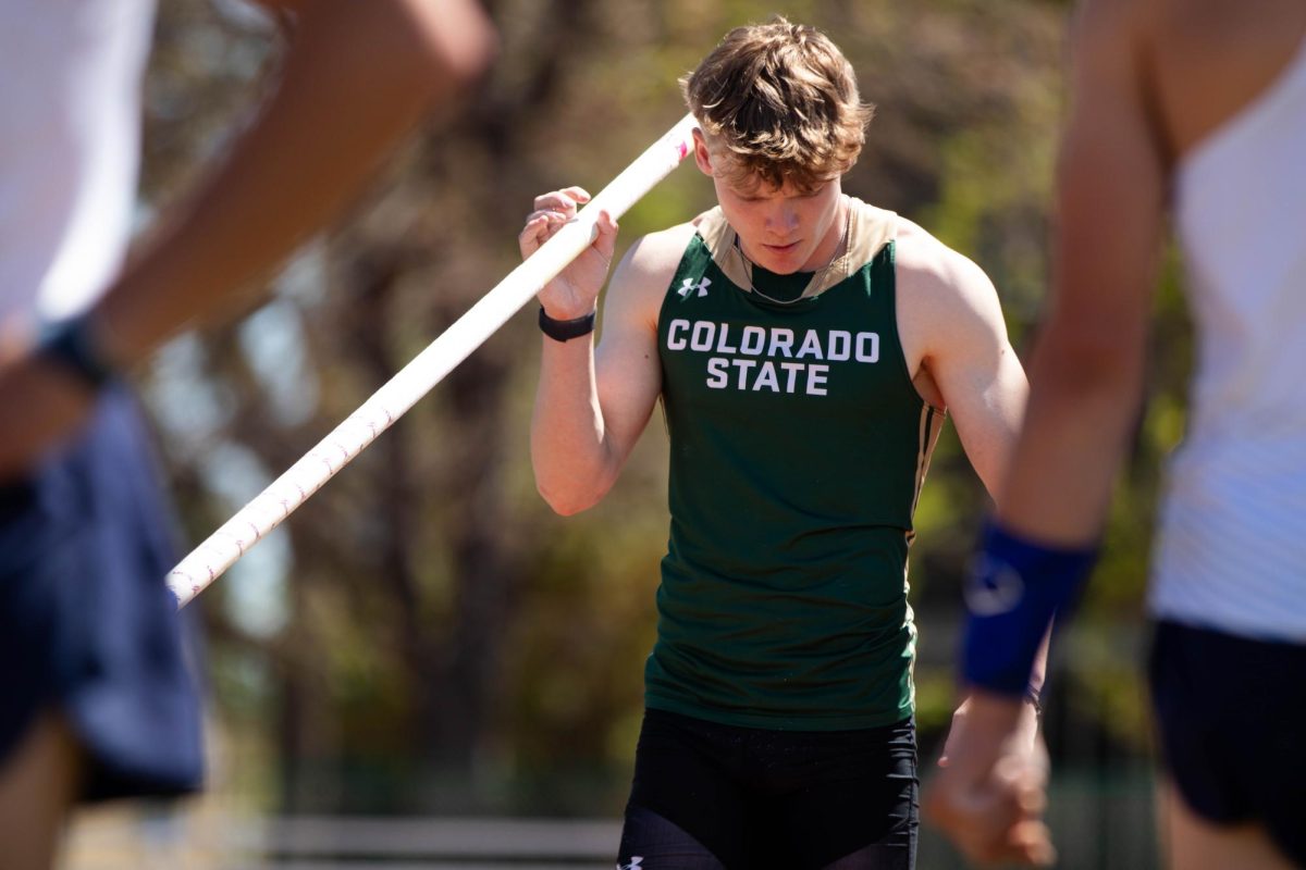 Sam Mrky prepares for the pole vault event during the Doug Max Invitational track meet at Colorado State University in Fort Collins Colorado on May 3. Photo taken by Erica Pickering.
