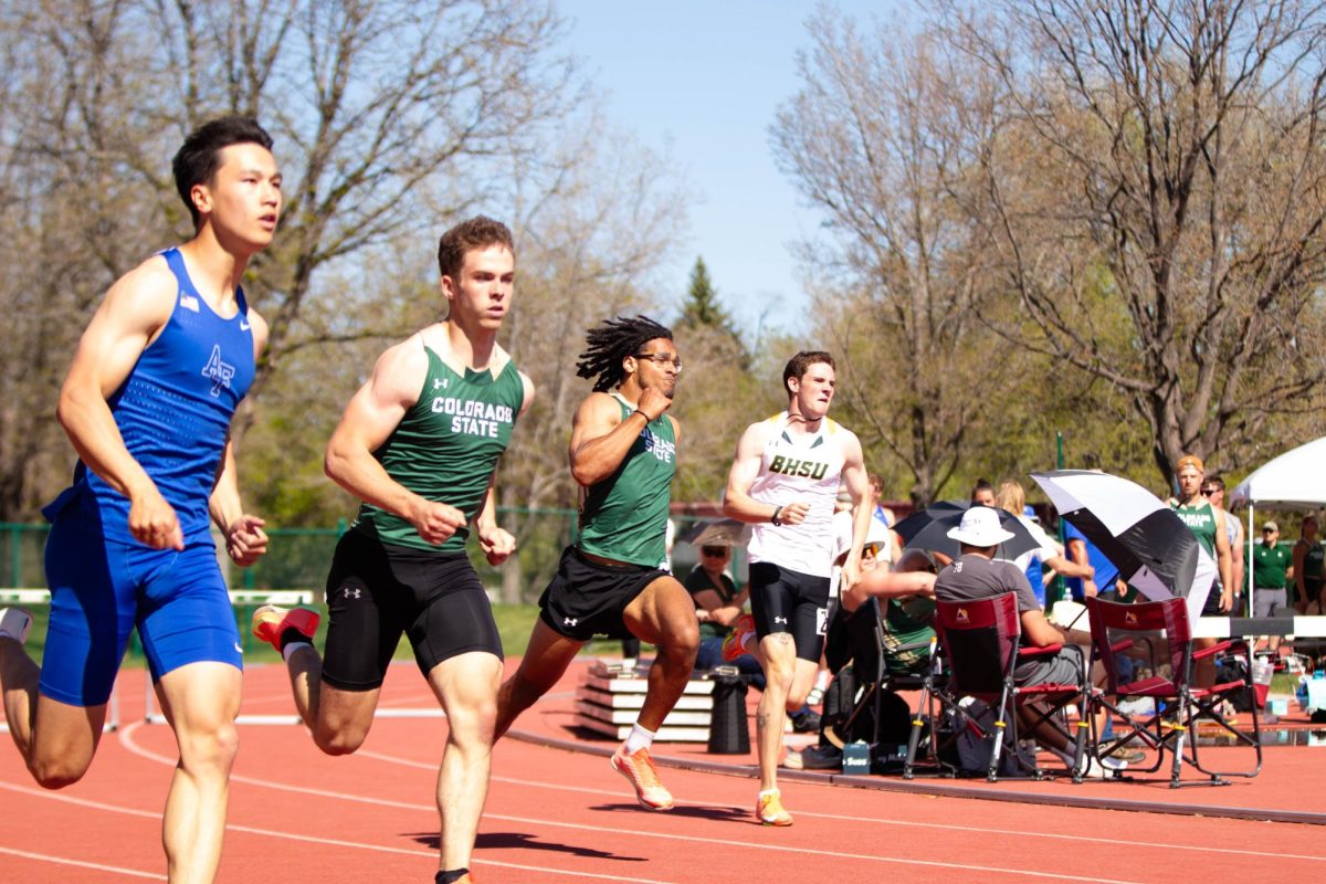 Colorado State University hurdlers race toward the finish line during the men's 400 meter event at the Doug Max Invitational track meet at Colorado State University in Fort Collins Colorado on May 3.  Photo taken by Erica Pickering.