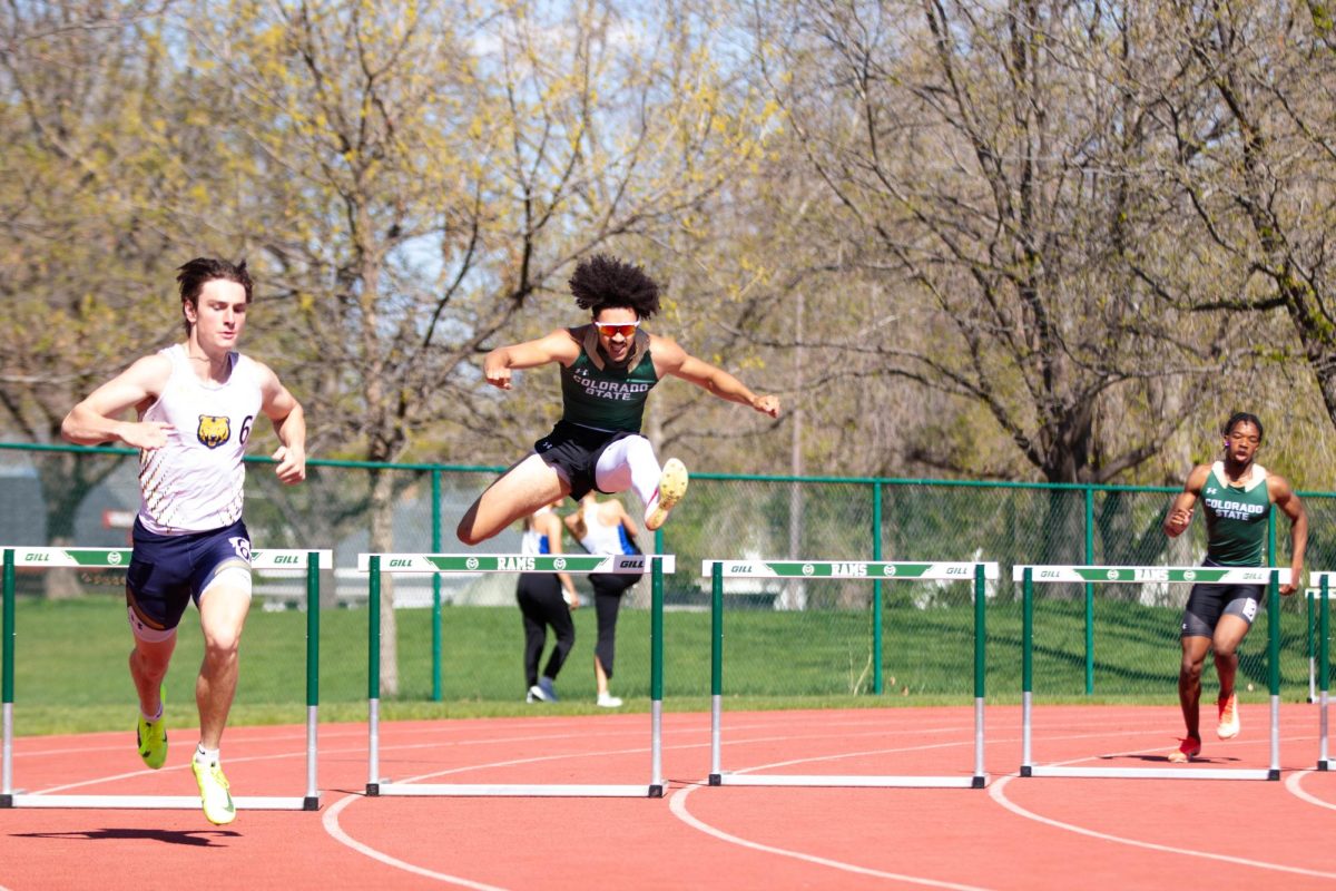 PJ Robinson hurdles toward the finish line during the men's 400 meter hurdles event at the Doug Max Invitational track meet at Colorado State University in Fort Collins Colorado on May 3. Photo taken by Erica Pickering.