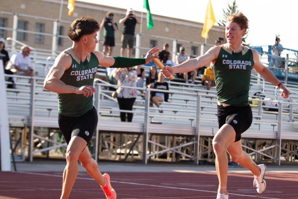 Colorado State UNiversity athletes hands off the baton during the men's 4x 400 meter relayat the Doug Max Invitational track meet at Colorado State University in Fort Collins Colorado on May 3.  Photo taken by Erica Pickering.