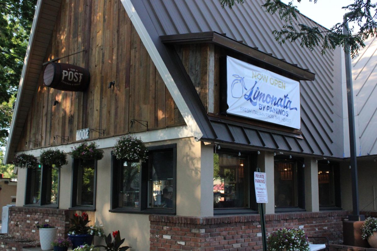 A banner on the building formerly occupied by The Post announces the opening of Limonata, an Italian restaurant on College Avenue from the owners of the now-closed Paninos July 13.