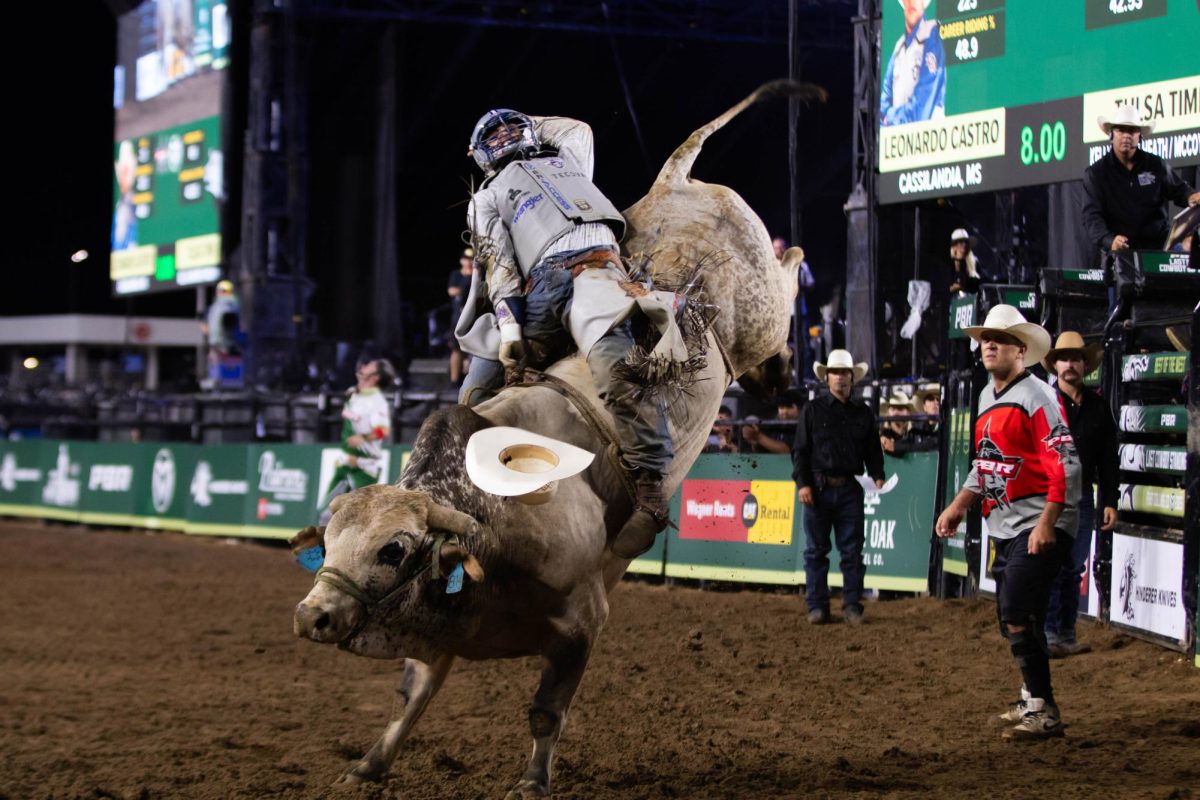 Pro bull rider Leonardo Castro, winner of PBR's The Last Cowboy Standing event, rides his last ride of the night at Colorado State University's Canvas Stadium in Fort Collins Colorado on July 22, 2025. Photo taken by Erica Pickering.