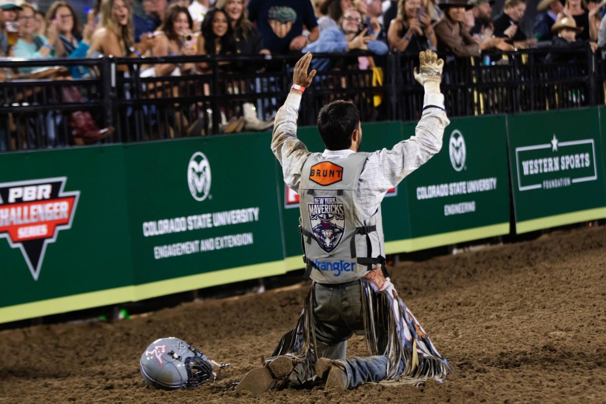 Pro bull rider Leonardo Castro, celebrating his winning ride at PBR's The Last Cowboy Standing event at Colorado State University's Canvas Stadium in Fort Collins Colorado on July 22, 2025. Photo taken by Erica Pickering.