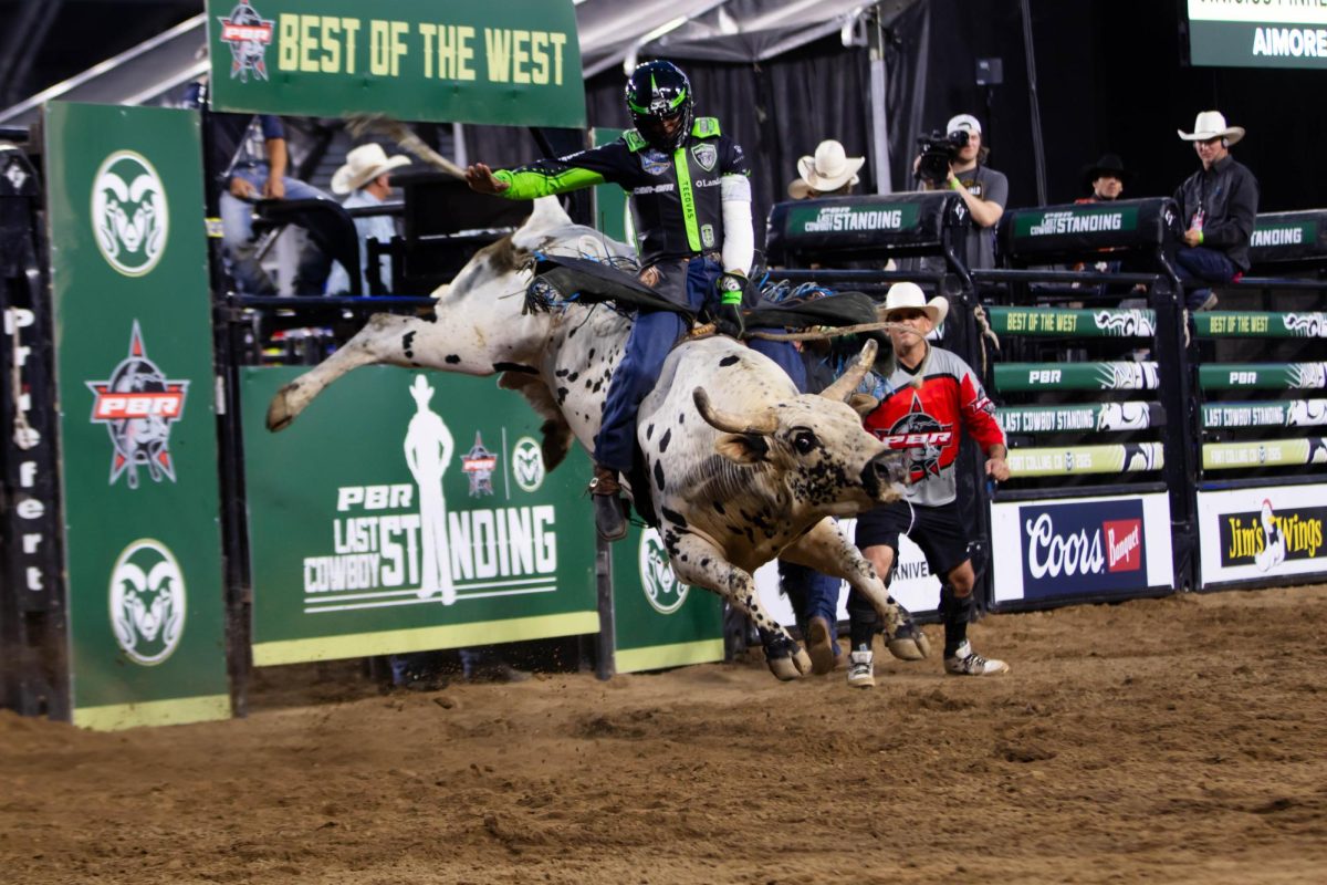 Pro bull rider Daylon Swearingen fights to stay on during his ride at Colorado Staet University's Canvas Stadium in Fort Collins Colorado on July 21, 2025. Photo taken by Erica Pickering.