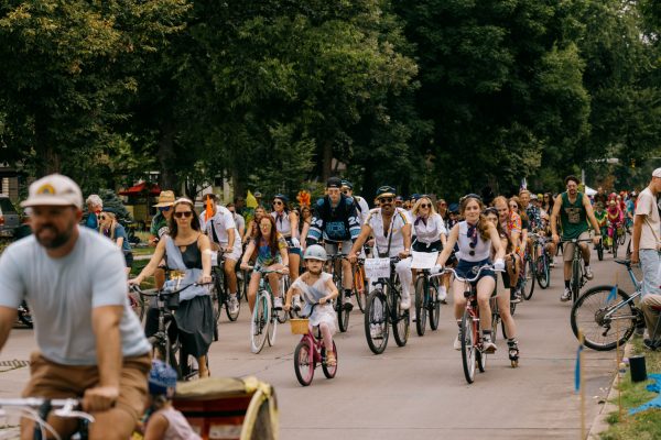 Costumed cyclists bike down Mountain Avenue during New Belgium Brewing Company's annual Tour de Fat bike festival Aug. 23.