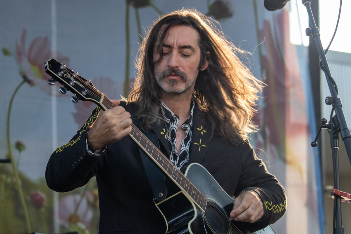 Adam Turla, the lead vocalist for Murder By Death, plays guitar during the band's performance at Tour de Fat Aug. 23. The performance was part of the band's farewell tour after being active for 25 years.
